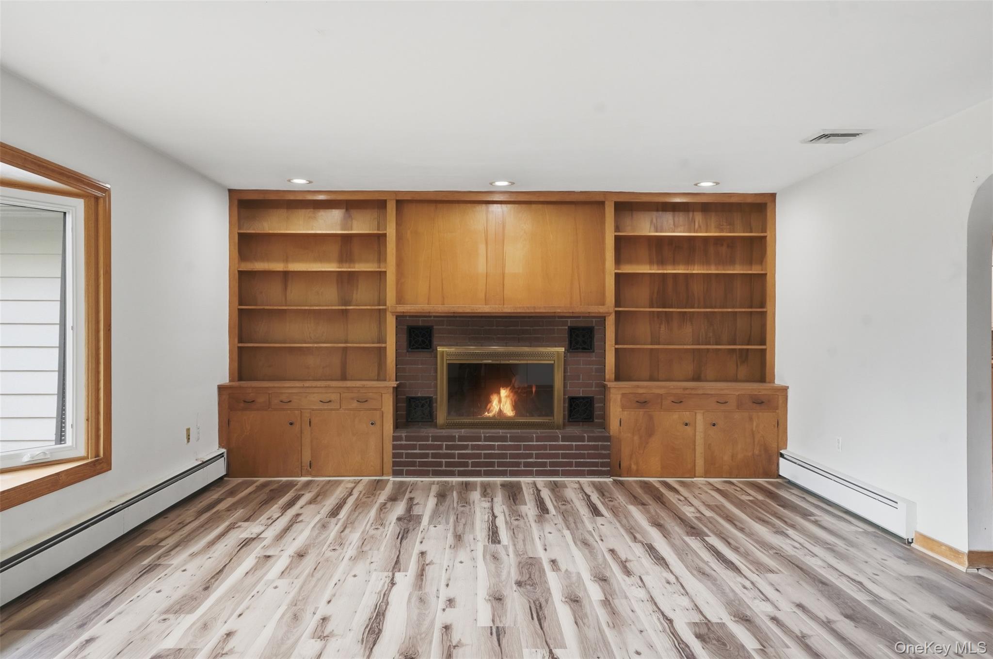 435 Samsonville Road Kerhonkson, NY 12446 - Photo 8 of 37 a room with a fireplace