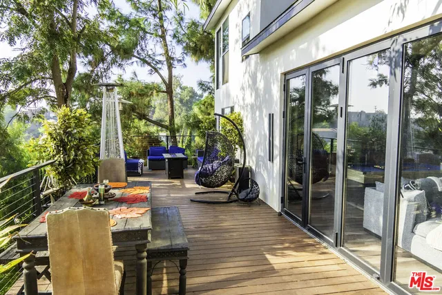 a view of swimming pool with a patio