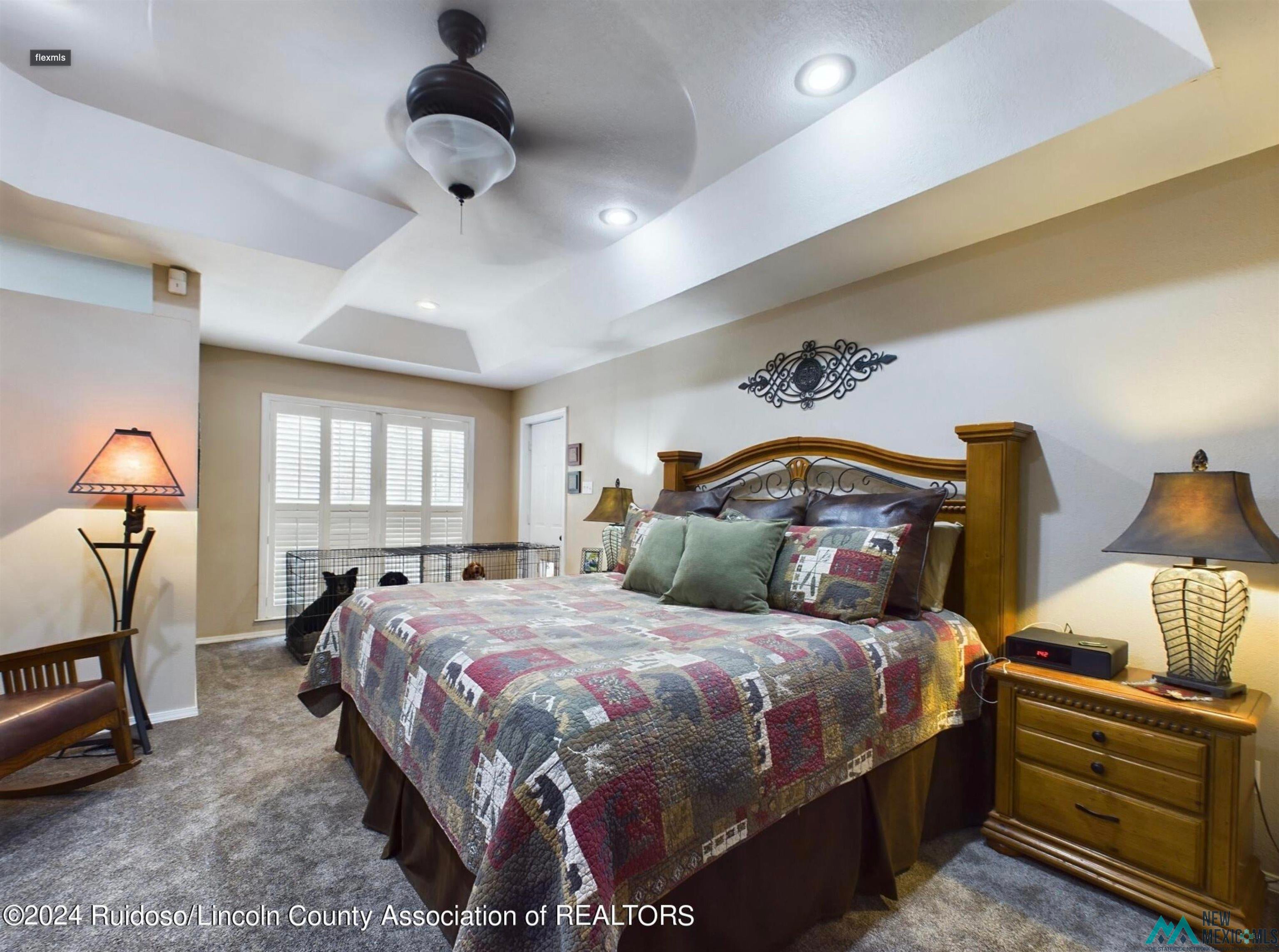 333 Ll Davis Drive Ruidoso, NM 88345 - Photo 17 of 25 Bedroom featuring a tray ceiling with recessed lighting and a ceiling fan
