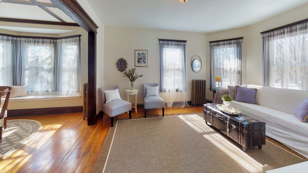 43 Longfellow Terrace Springfield, MA 01108 - Photo 11 of 25 a living room with furniture and a large window