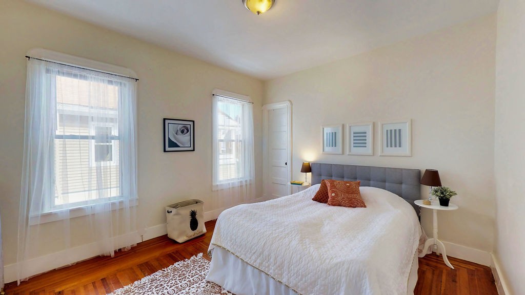 43 Longfellow Terrace Springfield, MA 01108 - Photo 15 of 25 a bedroom with a bed and window