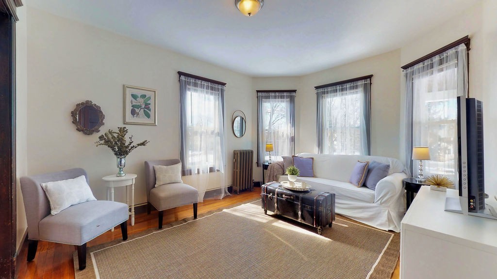 43 Longfellow Terrace Springfield, MA 01108 - Photo 9 of 25 a living room with furniture and a window