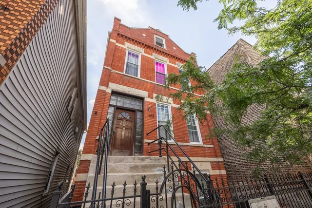 a kitchen with stainless steel appliances granite countertop a stove a sink dishwasher and a microwave oven with cabinets