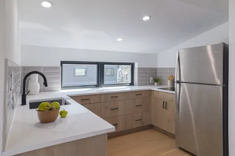 a bedroom with a bed and furniture