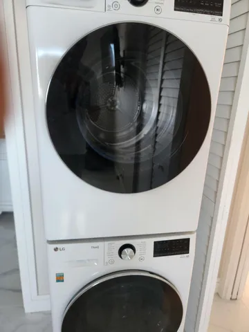 a view of balcony with furniture