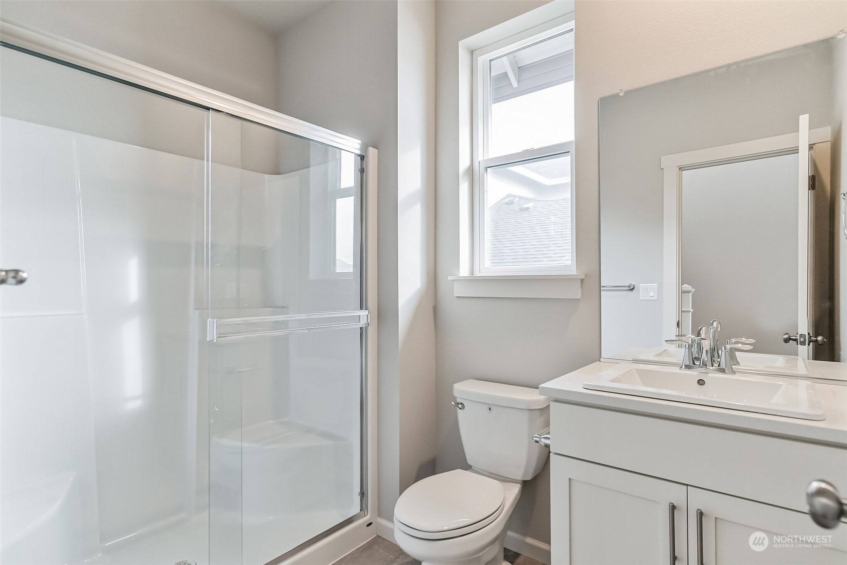 2719 South 9th Circle Ridgefield, WA 98642 - Photo 5 of 16 a bathroom with a sink toilet and shower