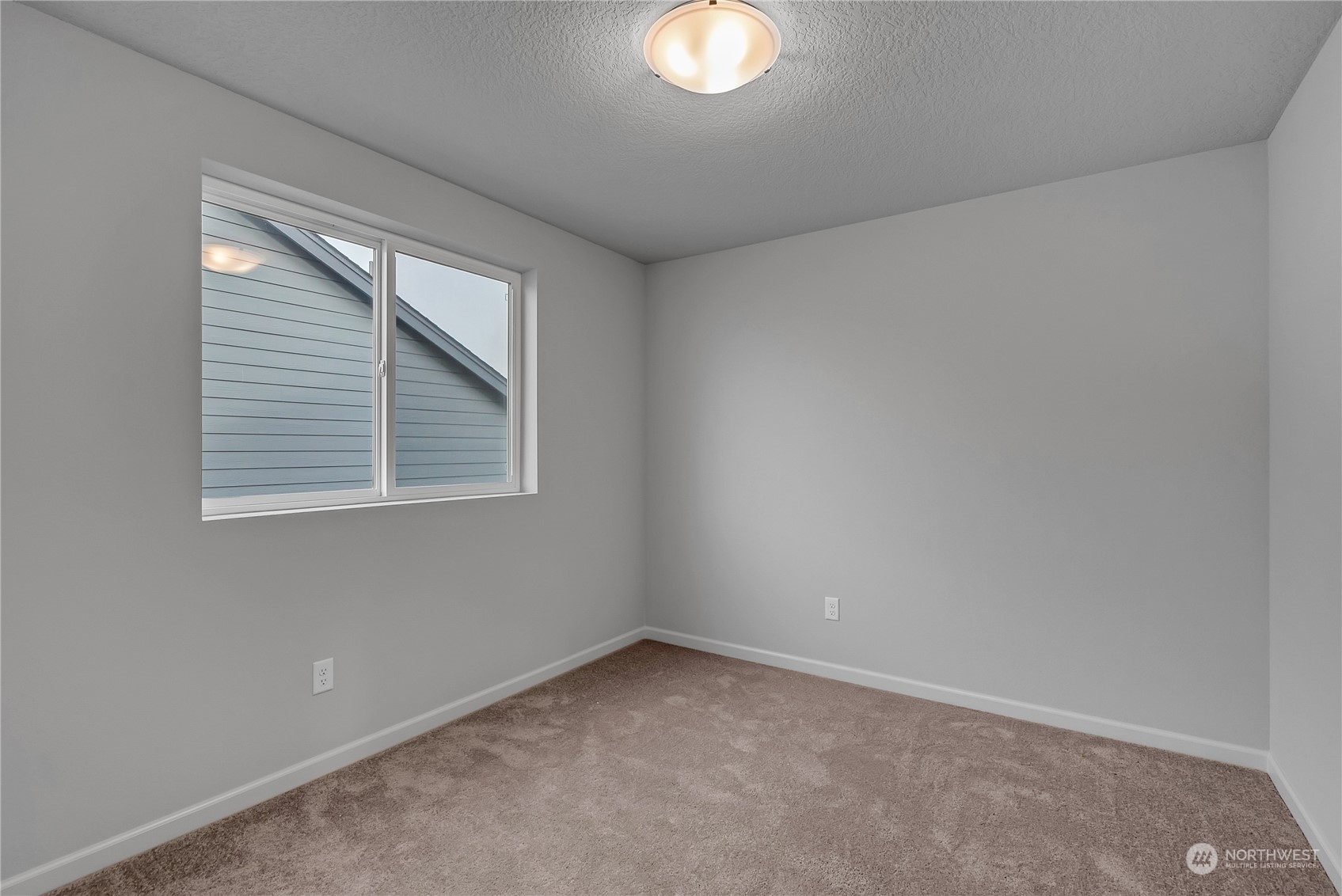 2719 South 9th Circle Ridgefield, WA 98642 - Photo 6 of 16 an empty room with a window