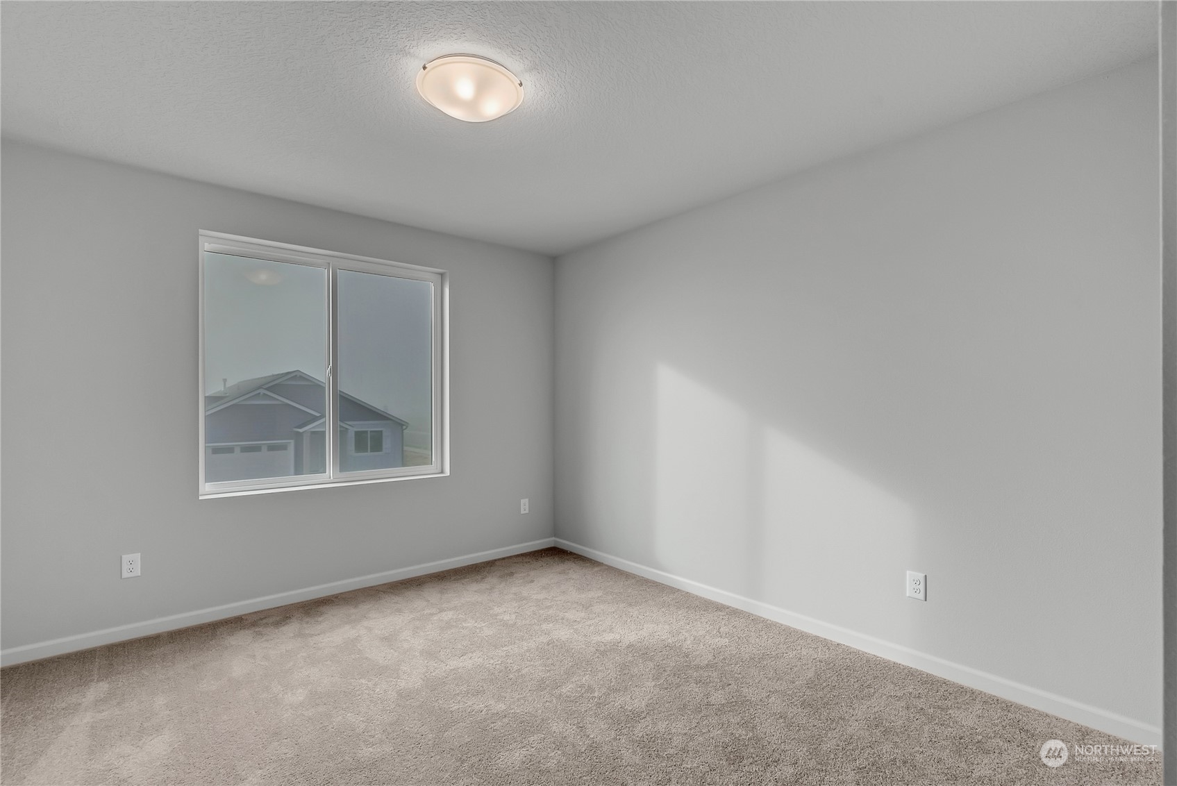 2719 South 9th Circle Ridgefield, WA 98642 - Photo 8 of 16 an empty room with a window