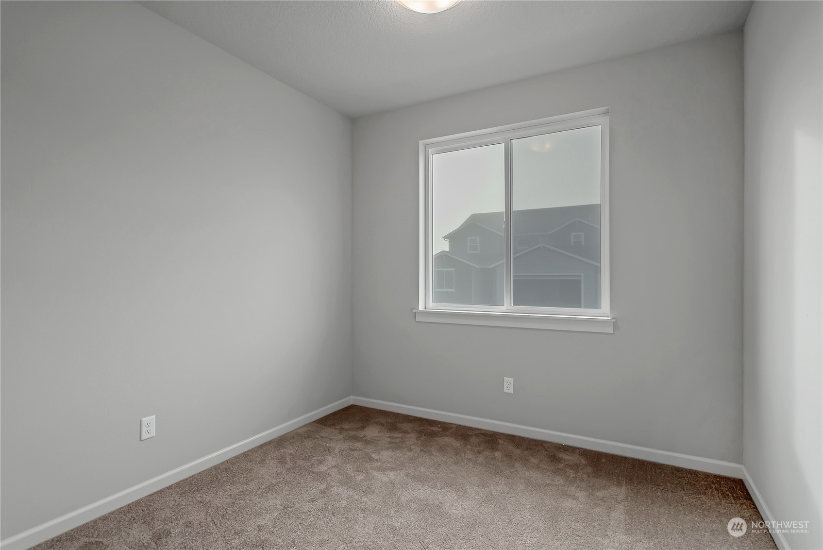 2719 South 9th Circle Ridgefield, WA 98642 - Photo 10 of 16 an empty room with a window