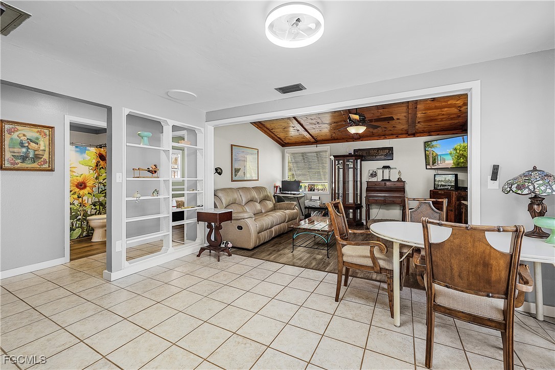 15925 Quail Trail Bokeelia, FL 33922 - Photo 11 of 26 a living room with furniture