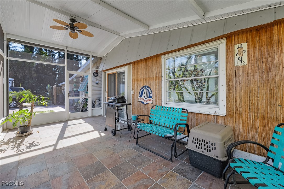 15925 Quail Trail Bokeelia, FL 33922 - Photo 20 of 26 a view of a livingroom with furniture and a window