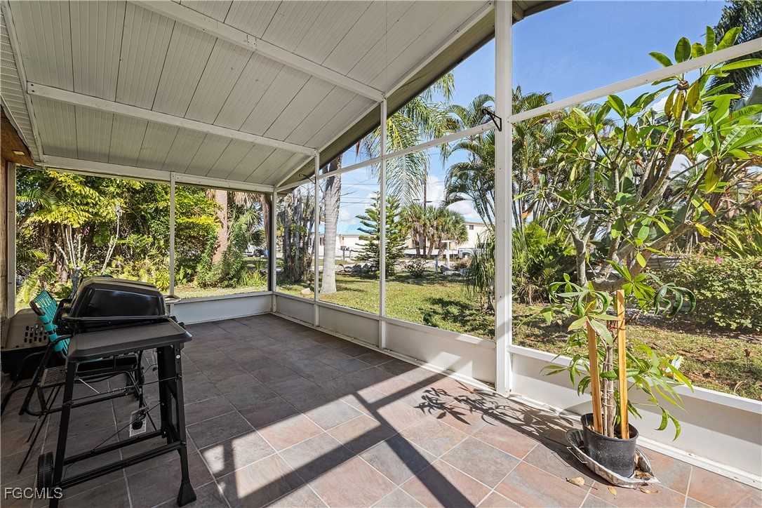 15925 Quail Trail Bokeelia, FL 33922 - Photo 21 of 26 a house view with a garden space