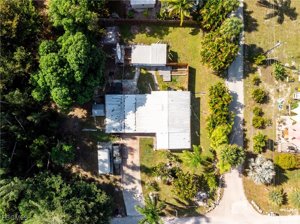 15925 Quail Trail Bokeelia, FL 33922 - Photo 23 of 26 an aerial view of residential houses with outdoor space