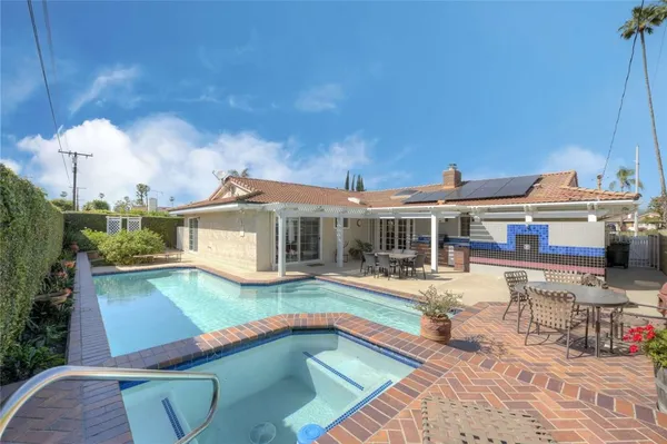 a view of a house with swimming pool