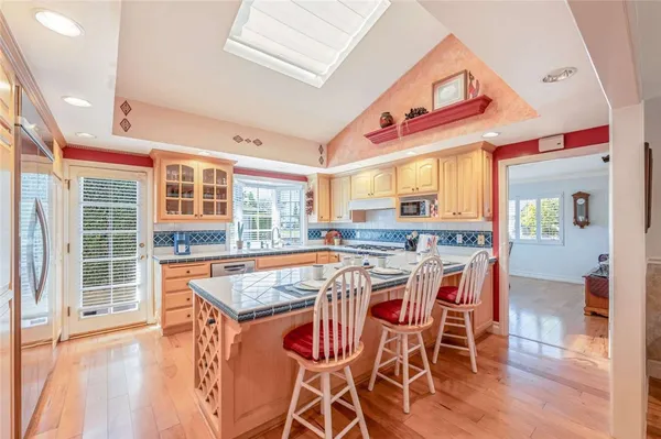 a dinning table and chairs in a room