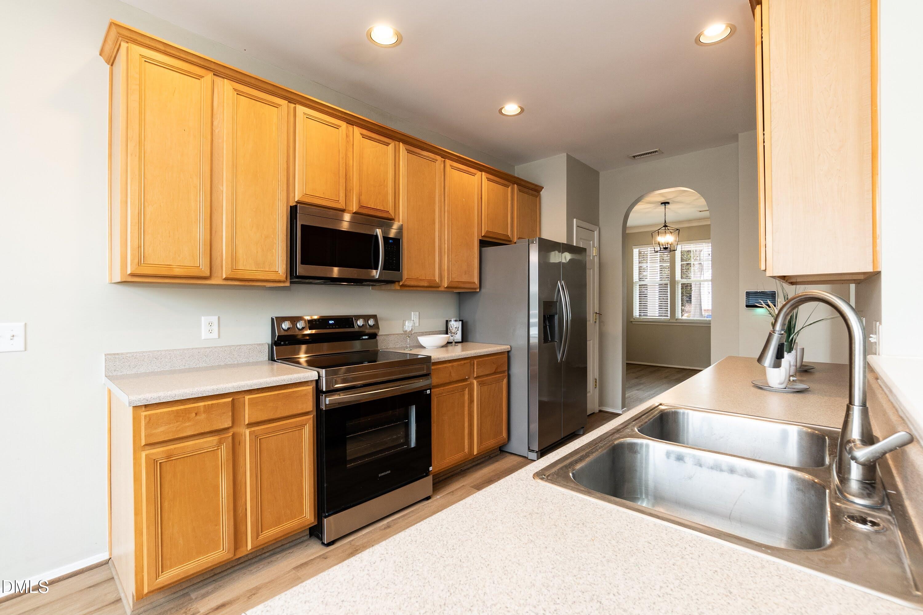 8310 Chimneycap Drive Raleigh, NC 27613 - Photo 12 of 38 Kitchen 04