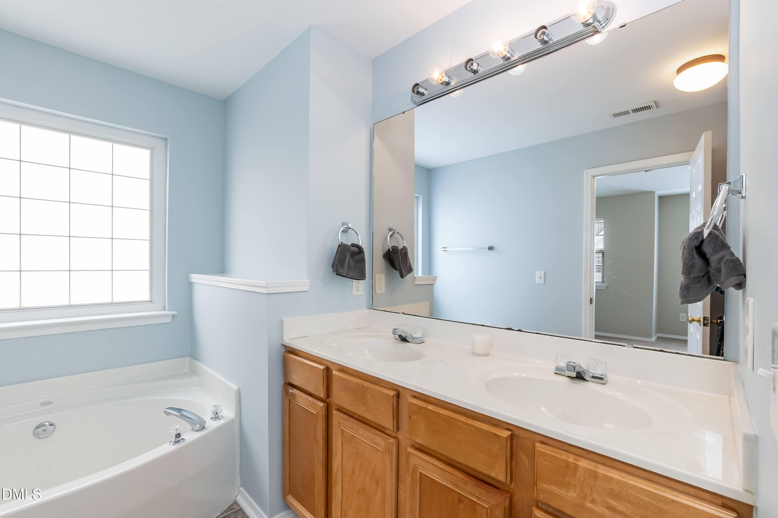 8310 Chimneycap Drive Raleigh, NC 27613 - Photo 26 of 38 Primary Bath 01