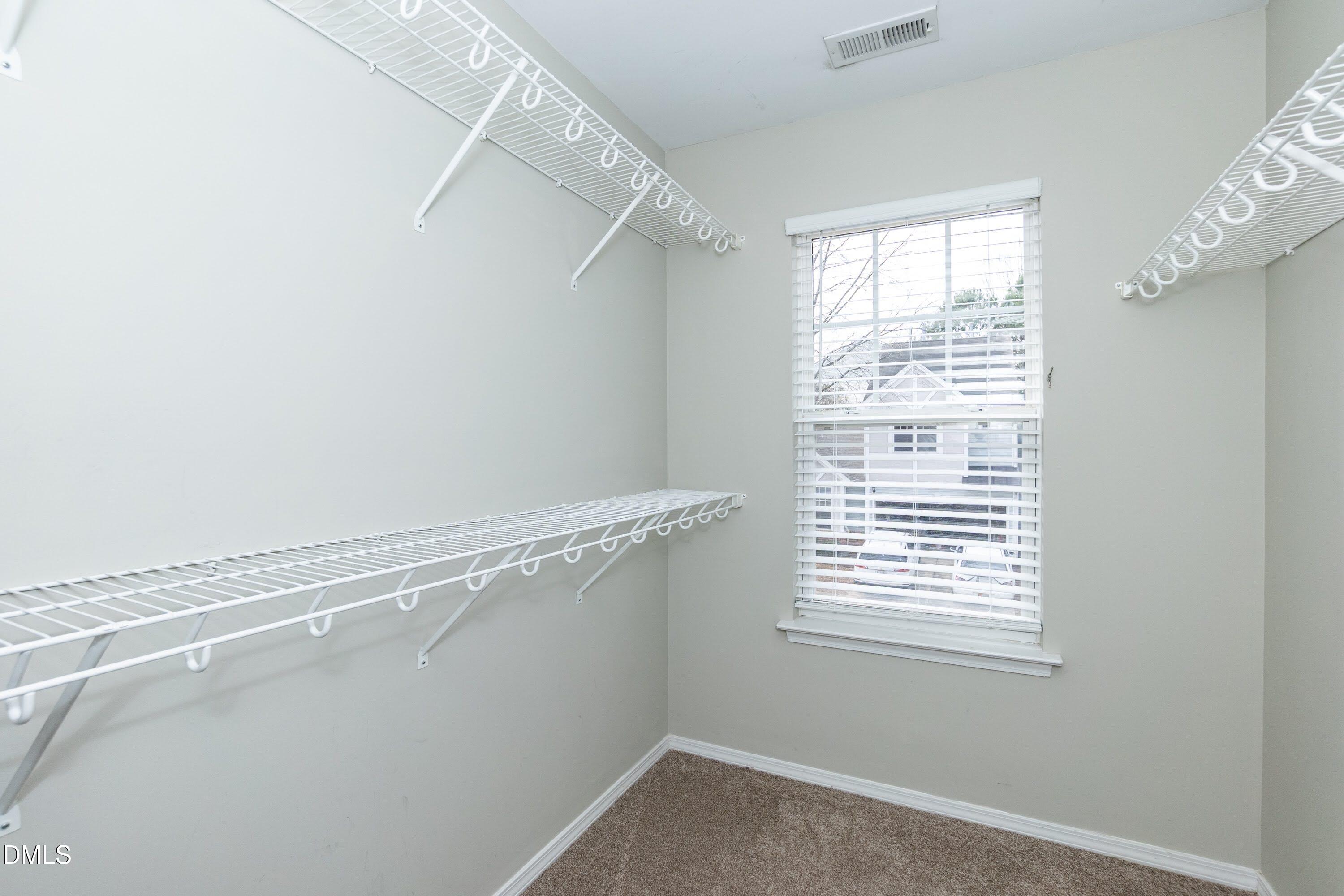 8310 Chimneycap Drive Raleigh, NC 27613 - Photo 28 of 38 Primary Closet 01