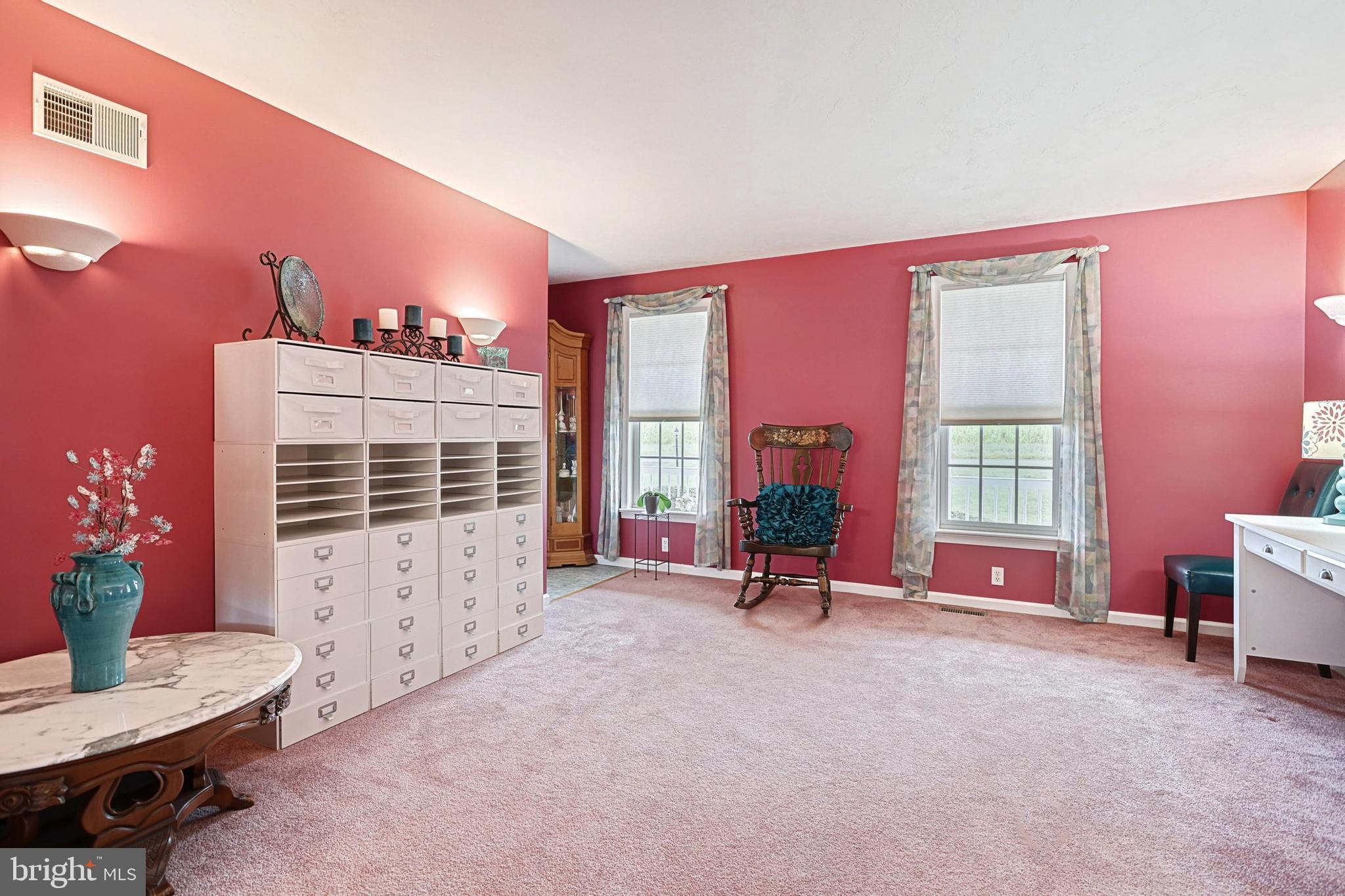 645 Kindig Road Littlestown, PA 17340 - Photo 29 of 61 a view of a livingroom with furniture and floor to ceiling window