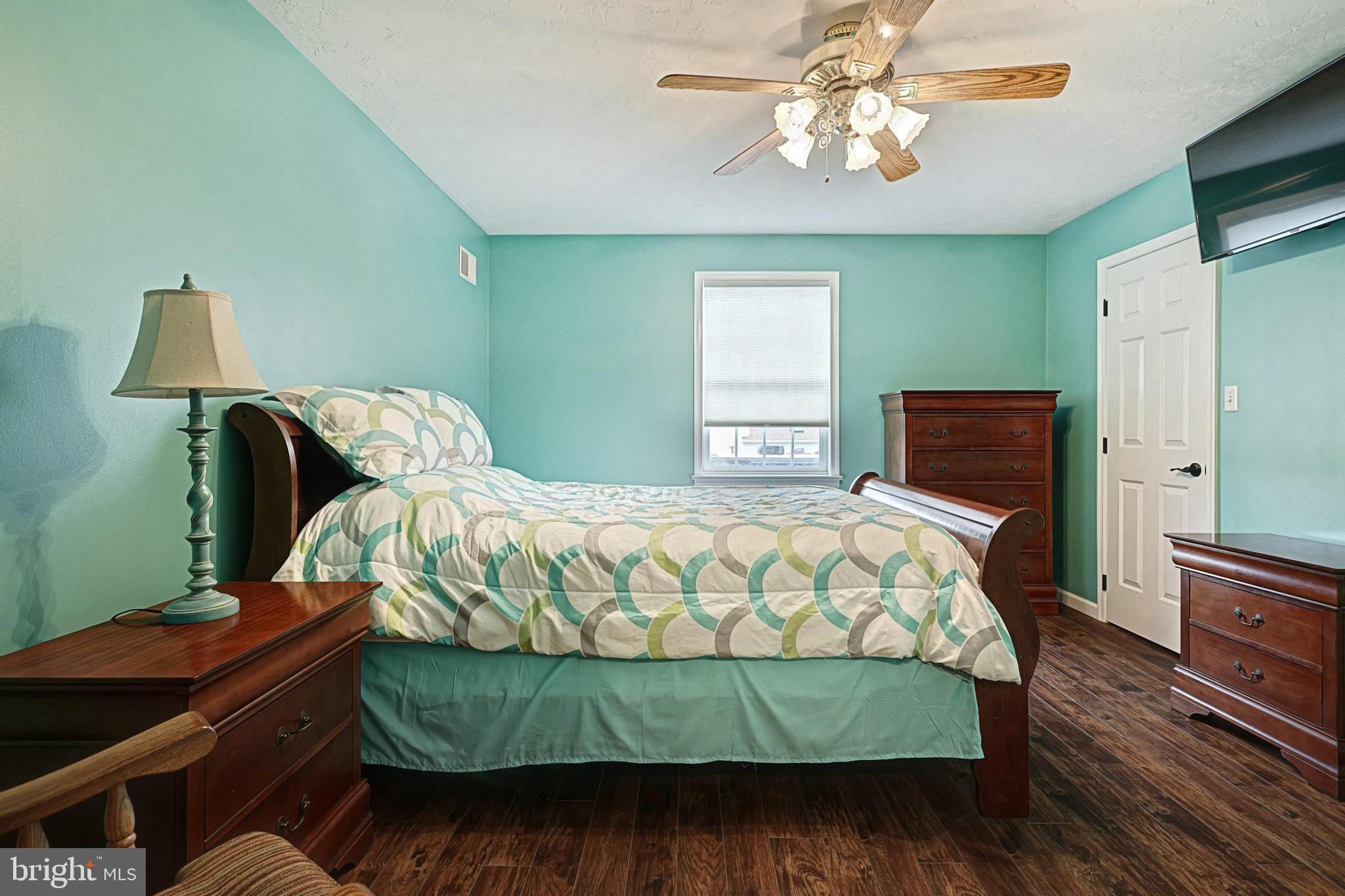 645 Kindig Road Littlestown, PA 17340 - Photo 34 of 61 a bedroom with a bed and wooden floor