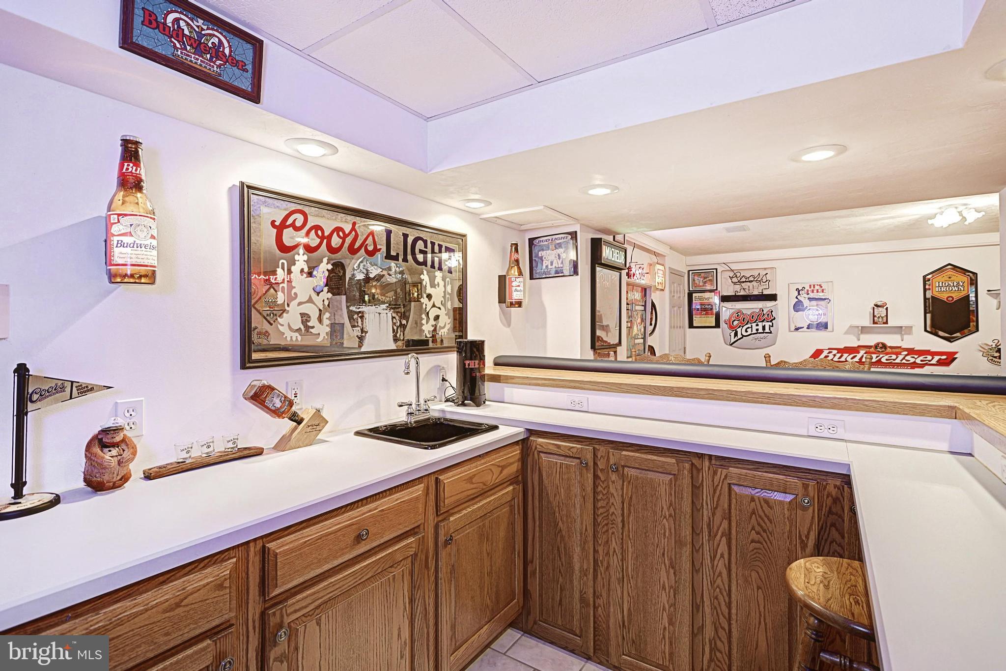 645 Kindig Road Littlestown, PA 17340 - Photo 47 of 61 a kitchen with a sink cabinets and a stove top oven