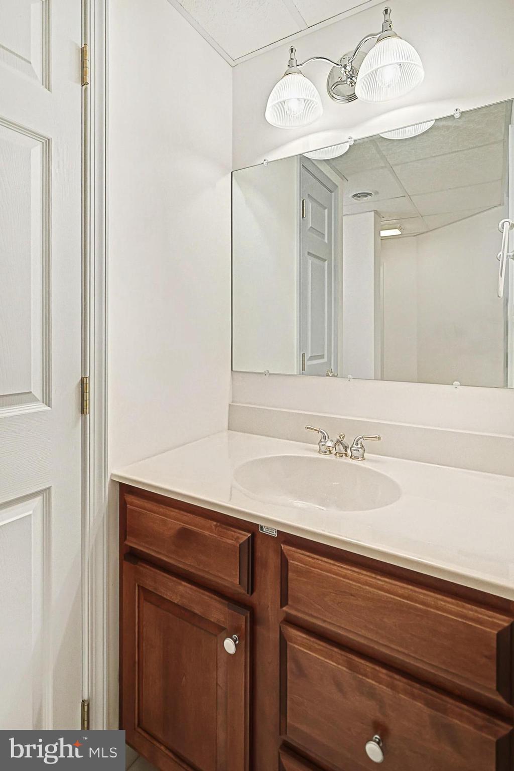645 Kindig Road Littlestown, PA 17340 - Photo 50 of 61 a bathroom with a sink and a mirror