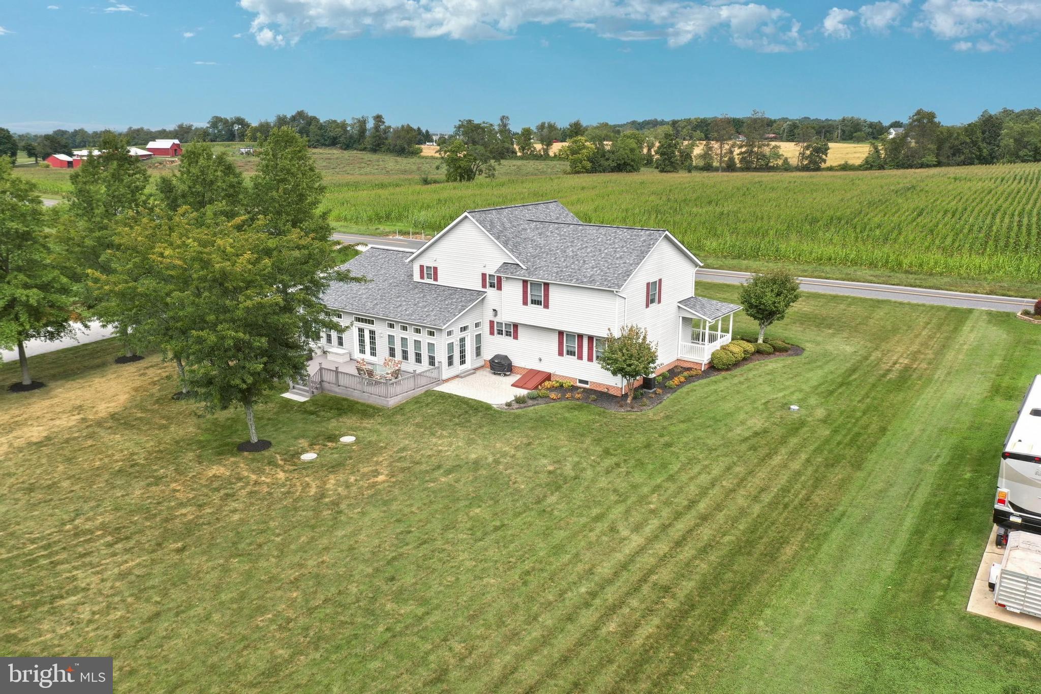 645 Kindig Road Littlestown, PA 17340 - Photo 53 of 61 an aerial view of a house with a garden and lake view