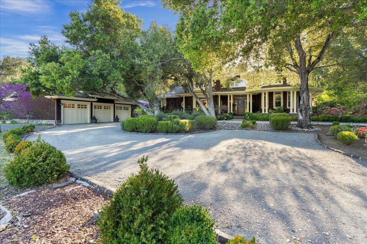 3510 Alpine Road Portola Valley, CA 94028 - Photo 4 of 77 a front view of a house with garden