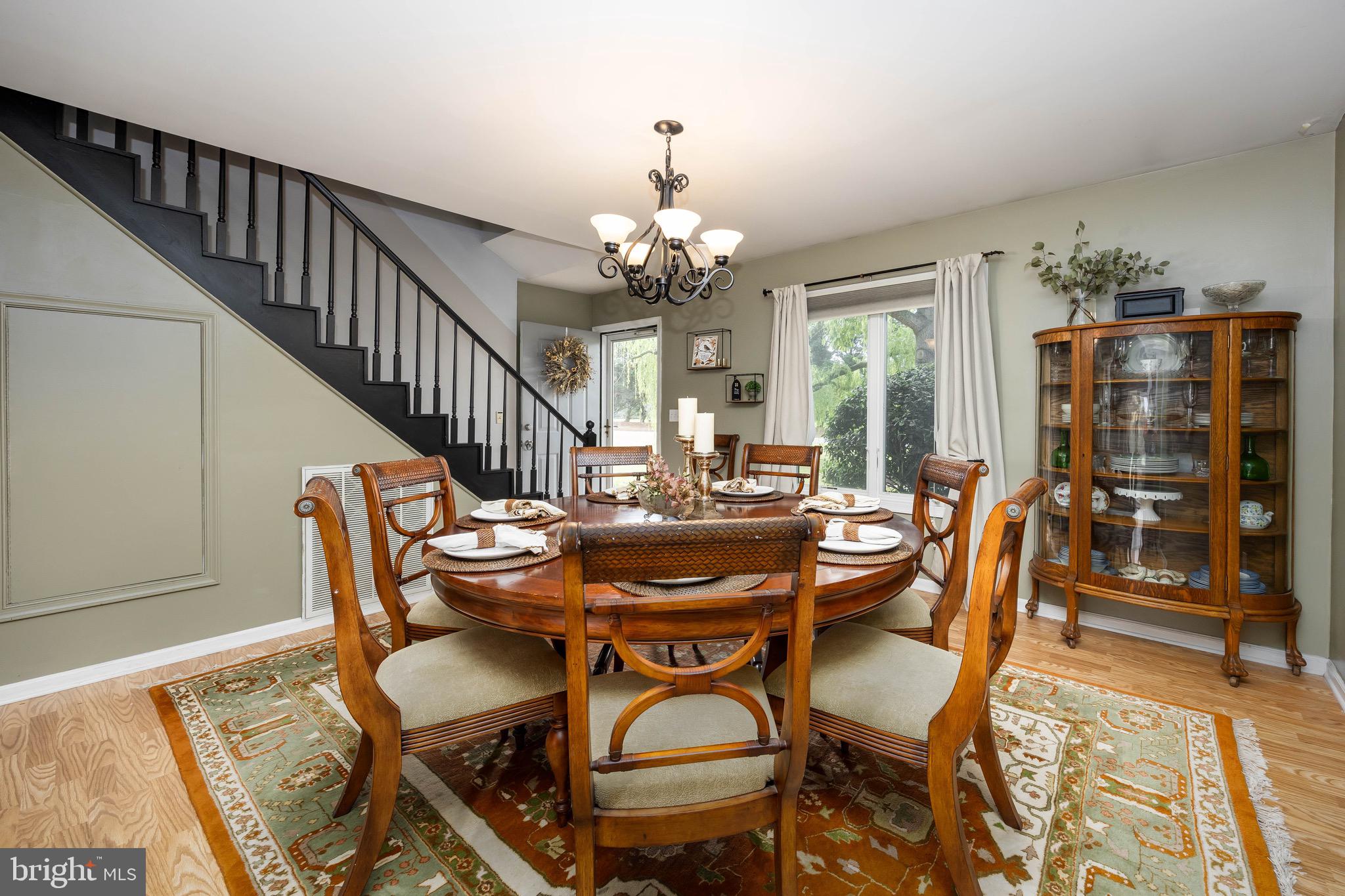 26882 Pratt Road Salisbury, MD 21801 - Photo 11 of 80 a view of a dining room with furniture and wooden floor