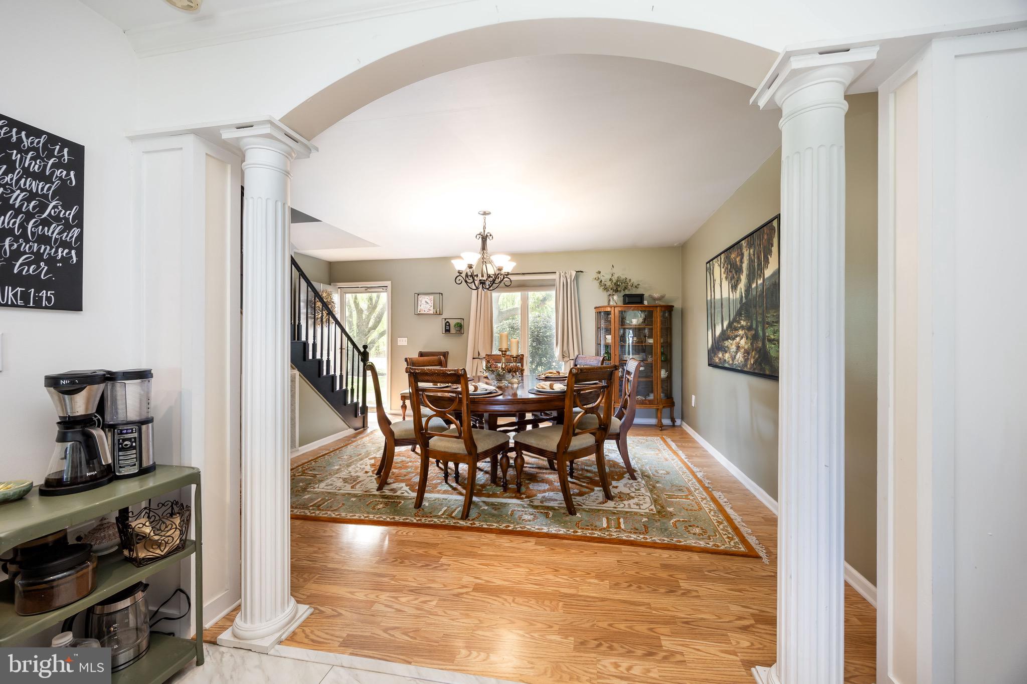 26882 Pratt Road Salisbury, MD 21801 - Photo 14 of 80 a view of a dining room with furniture and chandelier