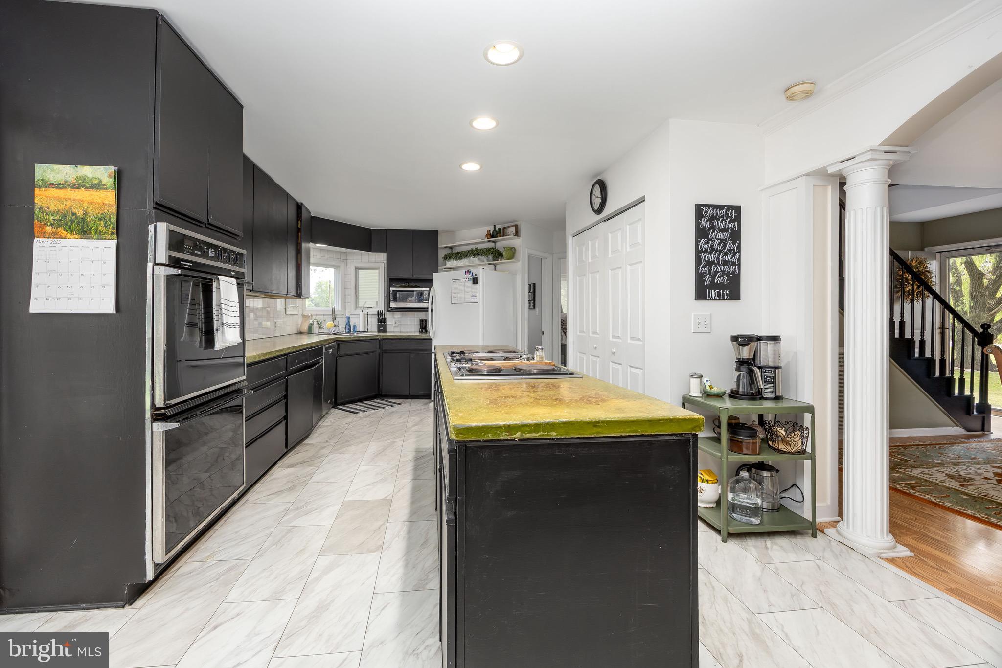 26882 Pratt Road Salisbury, MD 21801 - Photo 16 of 80 a kitchen with counter top space and stainless steel appliances