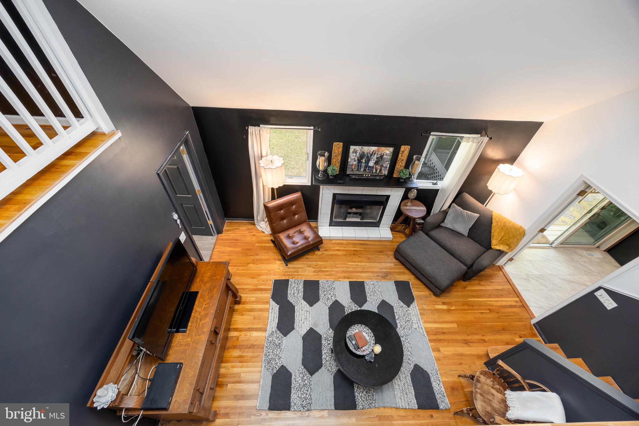 26882 Pratt Road Salisbury, MD 21801 - Photo 27 of 80 a living room with furniture and a flat screen tv
