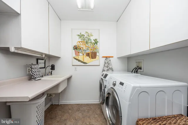 a view of a livingroom with furniture and a window