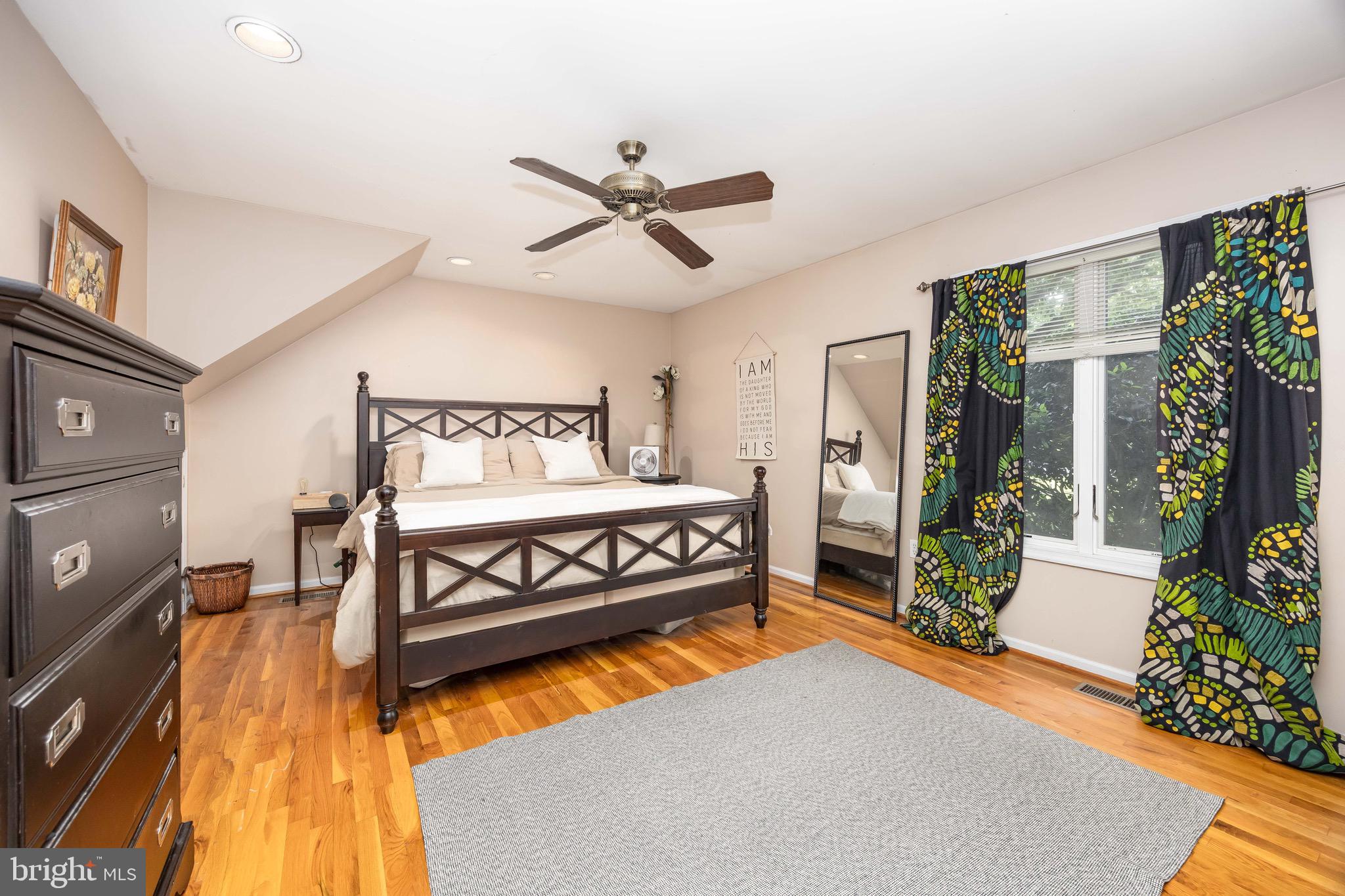 26882 Pratt Road Salisbury, MD 21801 - Photo 31 of 80 a bedroom with a bed and wooden floor