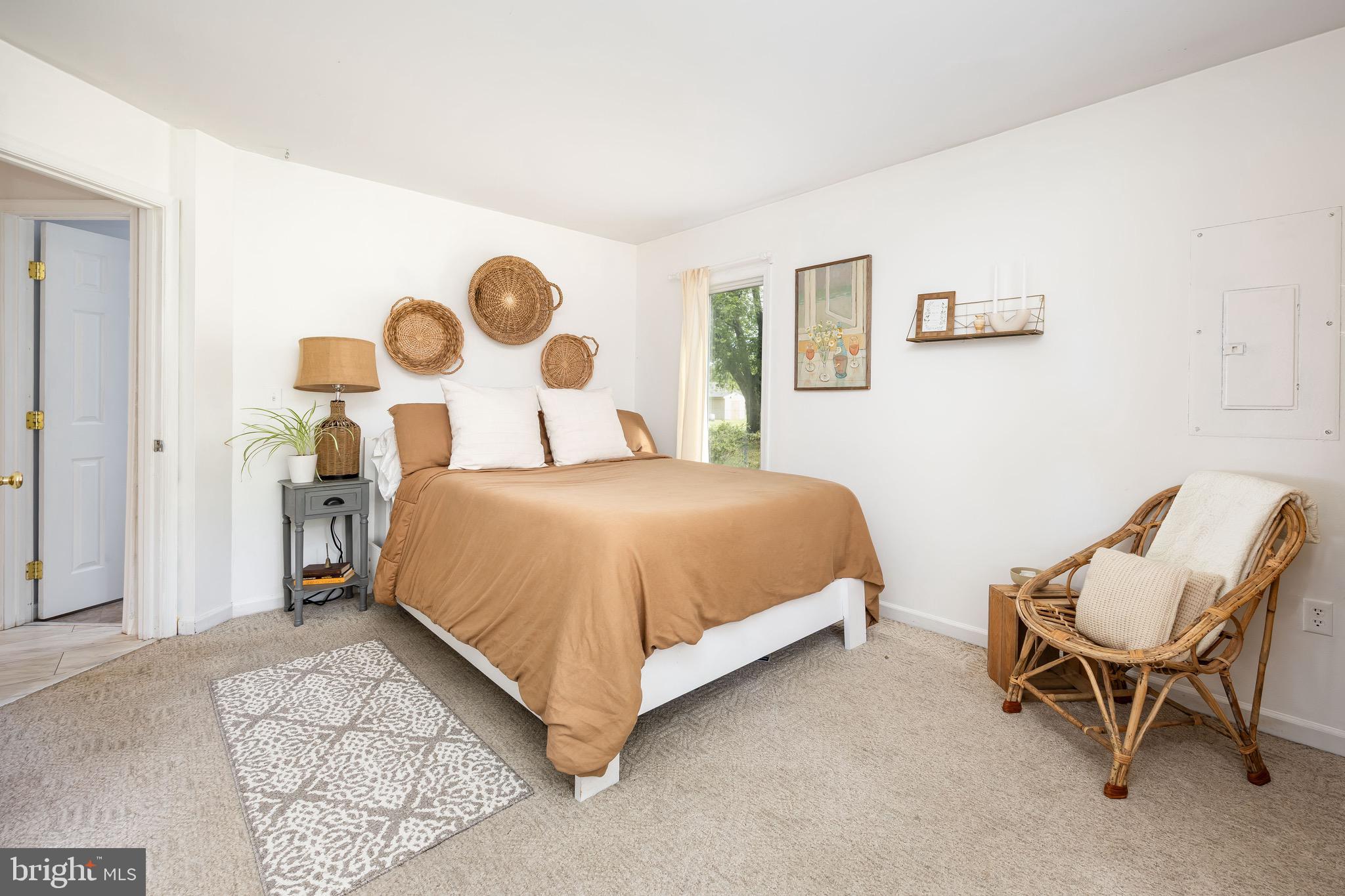 26882 Pratt Road Salisbury, MD 21801 - Photo 39 of 80 a bedroom with a bed and chair