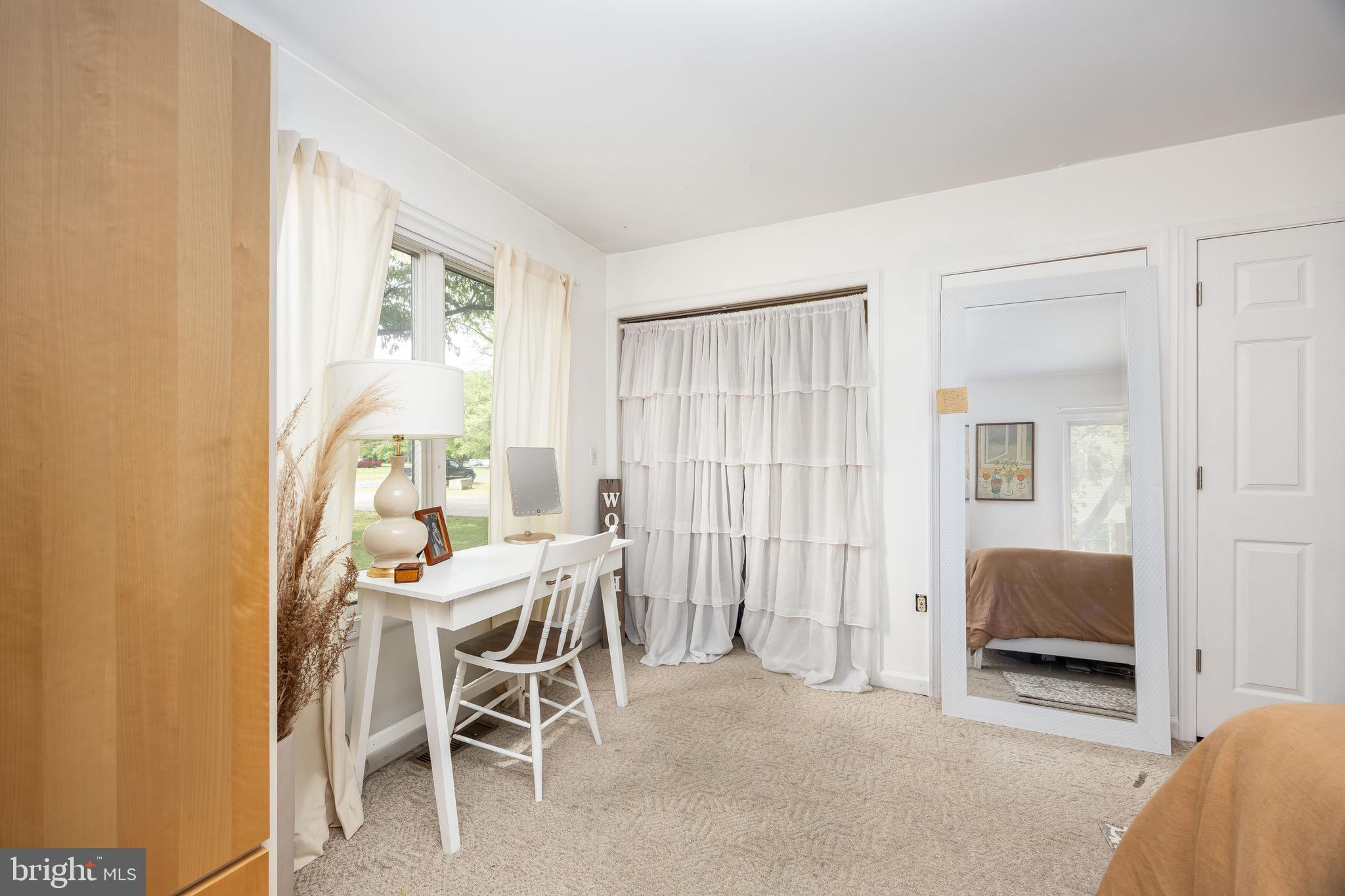 26882 Pratt Road Salisbury, MD 21801 - Photo 40 of 80 a view of a livingroom with furniture and a window