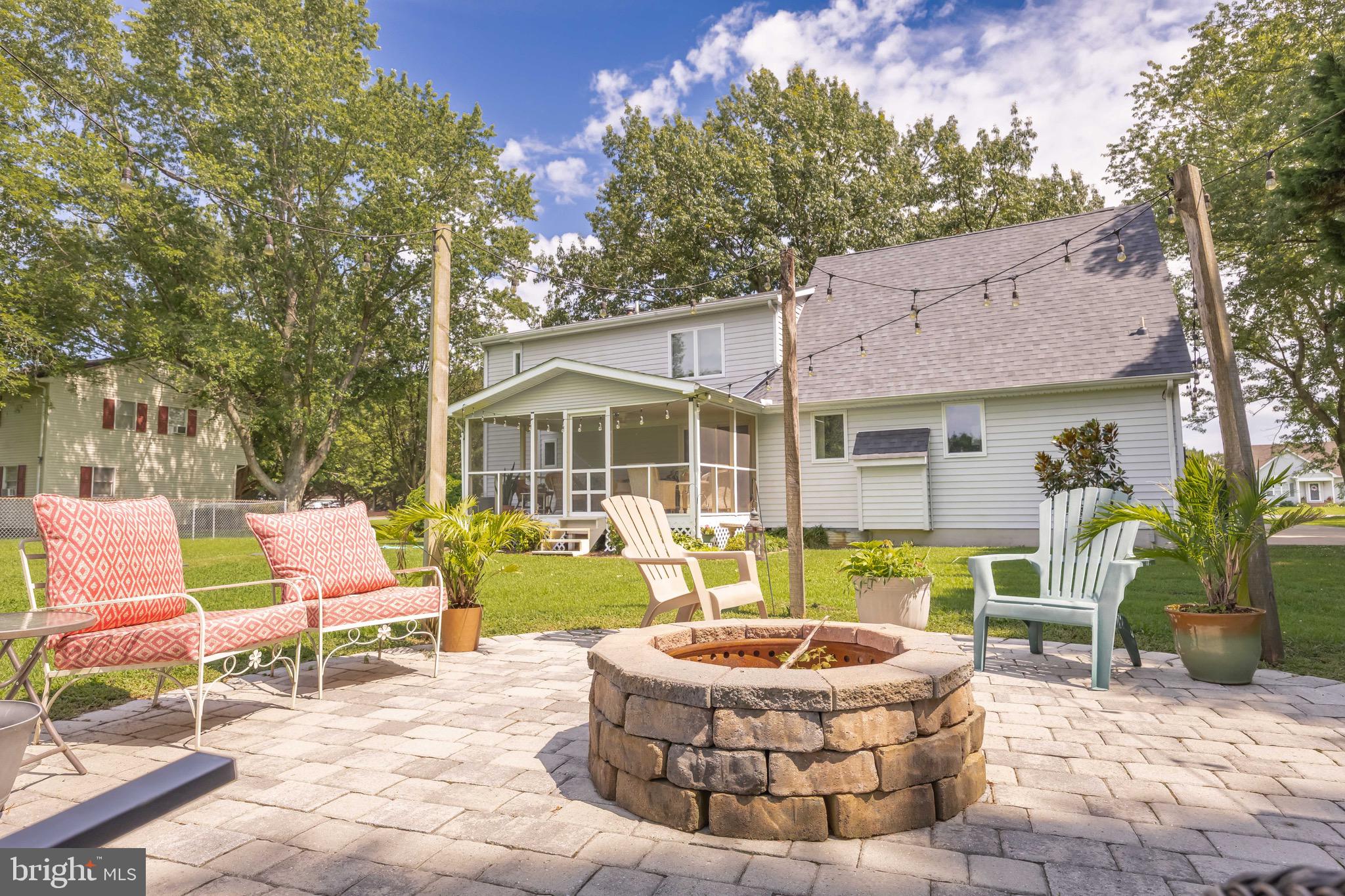26882 Pratt Road Salisbury, MD 21801 - Photo 62 of 80 a view of a house with backyard and sitting area