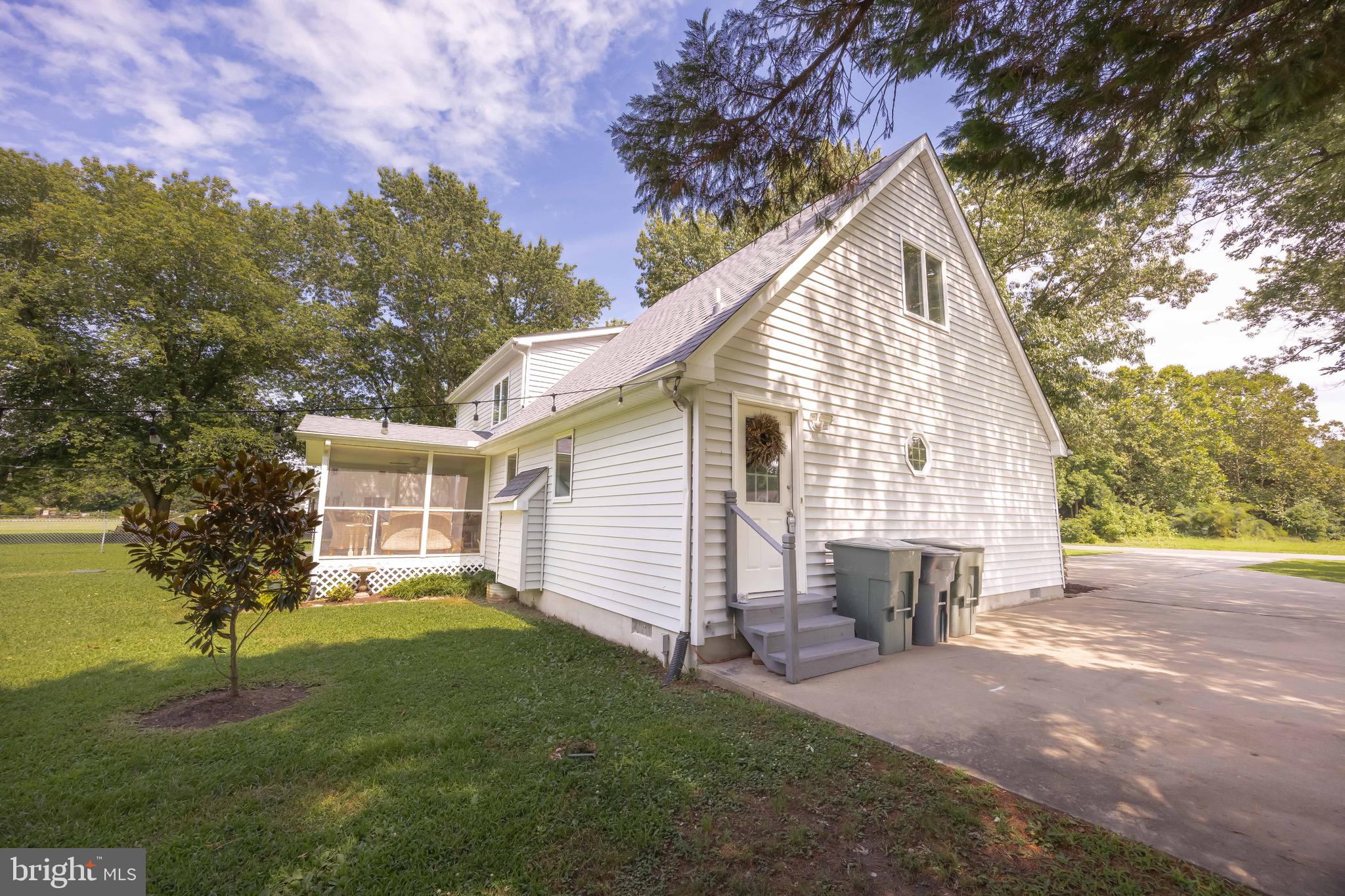 26882 Pratt Road Salisbury, MD 21801 - Photo 73 of 80 a view of backyard with a garden and trees