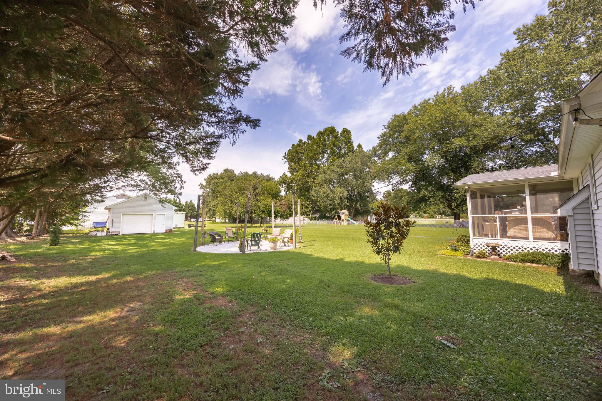 26882 Pratt Road Salisbury, MD 21801 - Photo 75 of 80 a view of a house with a yard porch and sitting area
