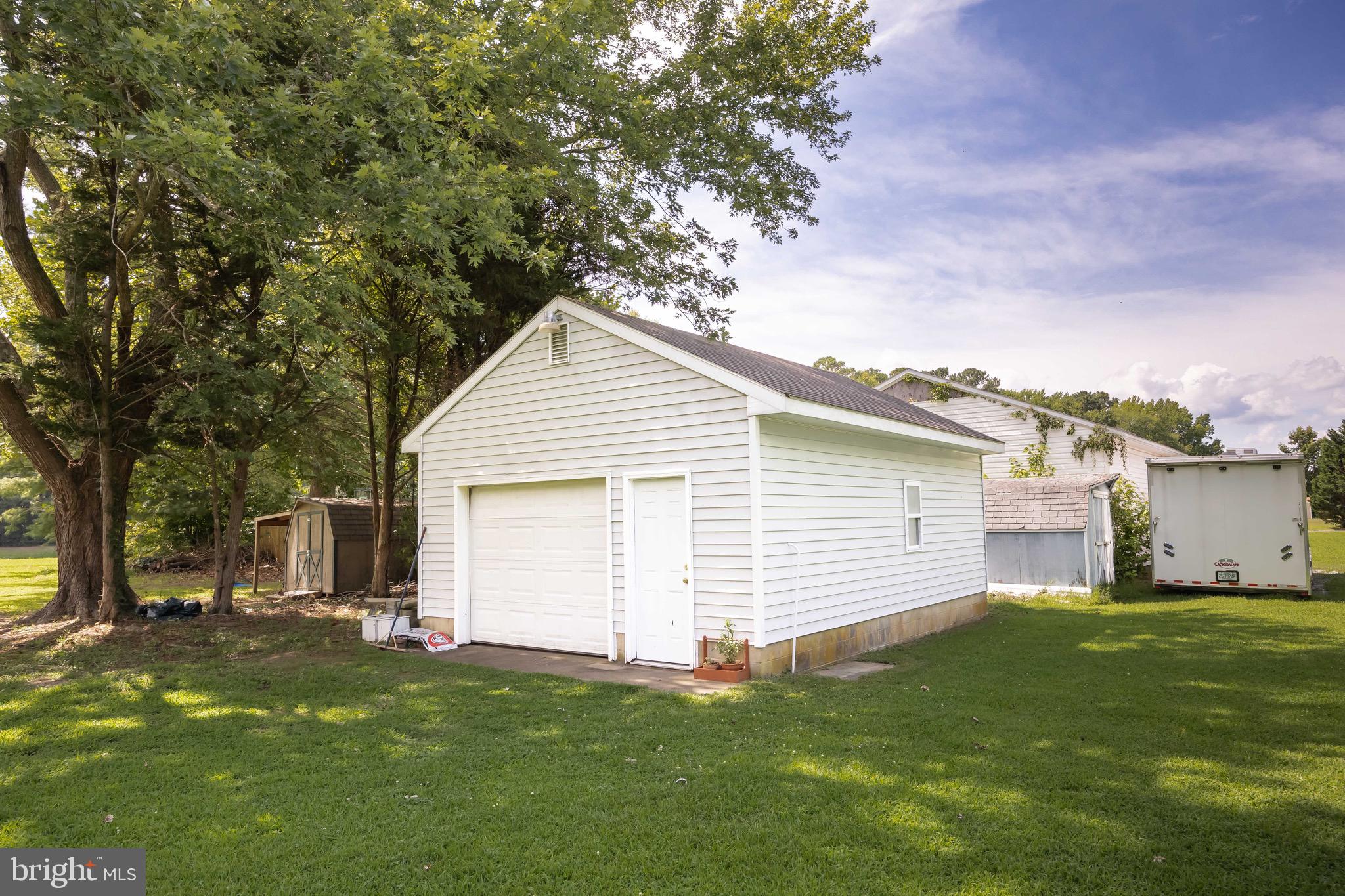26882 Pratt Road Salisbury, MD 21801 - Photo 76 of 80 a view of a backyard with a garden