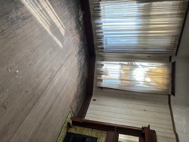 a view of a door with wooden door