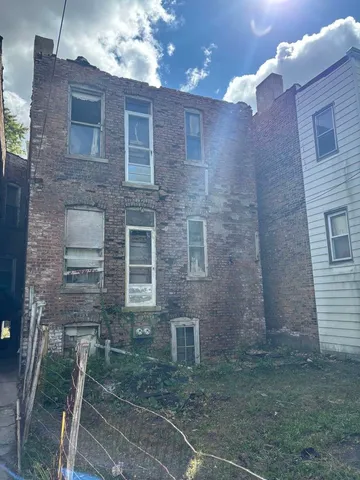 a brick building with a large windows