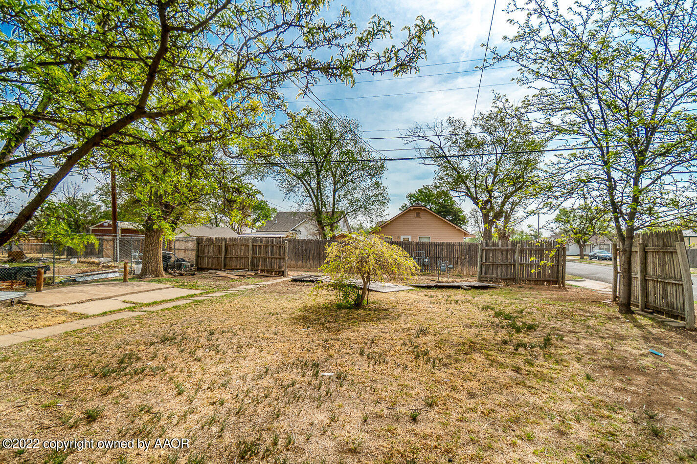 3711 South Harrison Street Amarillo, TX 79110 - Photo 18 of 20 a house with trees in front of it