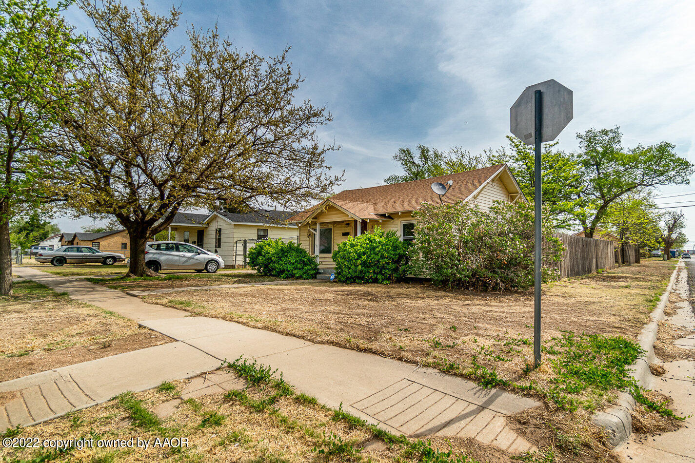 3711 South Harrison Street Amarillo, TX 79110 - Photo 3 of 20 a view of a house with a yard and tree s