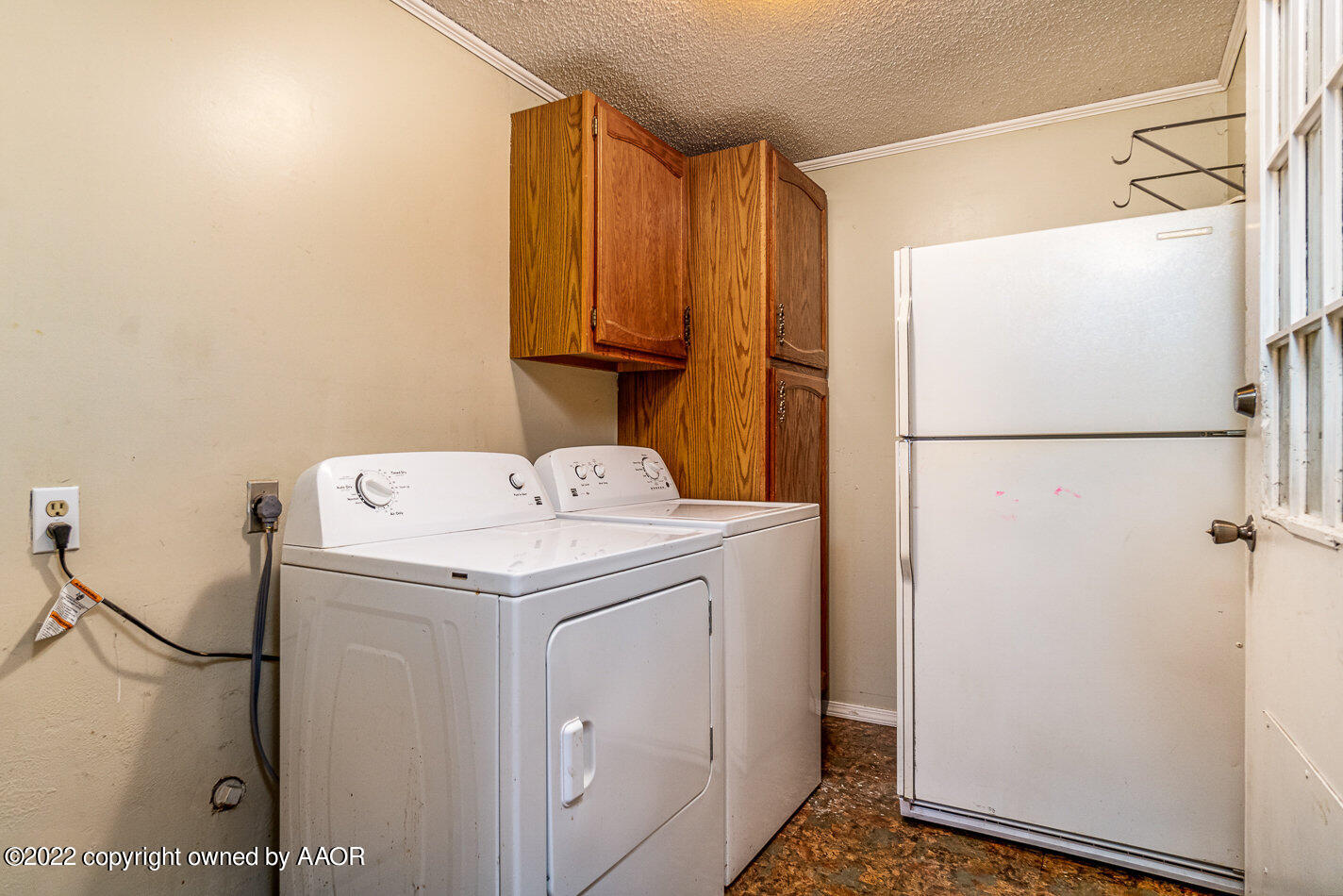 3711 South Harrison Street Amarillo, TX 79110 - Photo 10 of 20 a utility room with dryer and washer