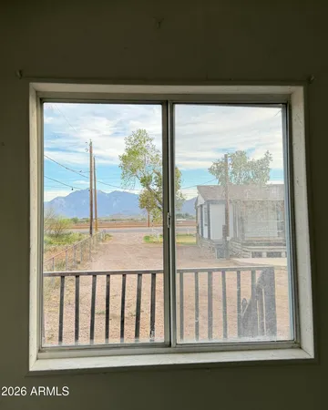 a view of a large window with an outdoor view
