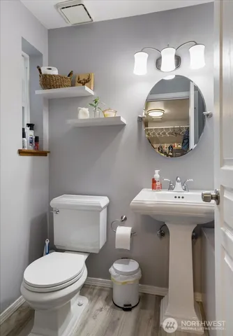 a bathroom with a sink and a toilet