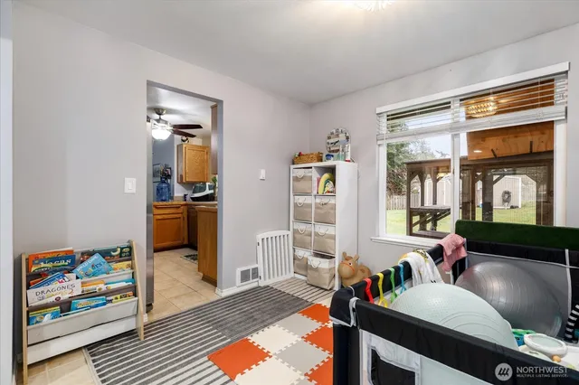 a living room with furniture and a window