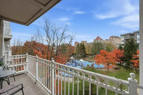 a view of a balcony with city view