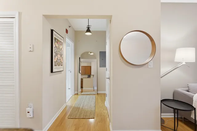 a view of a bedroom from a hallway